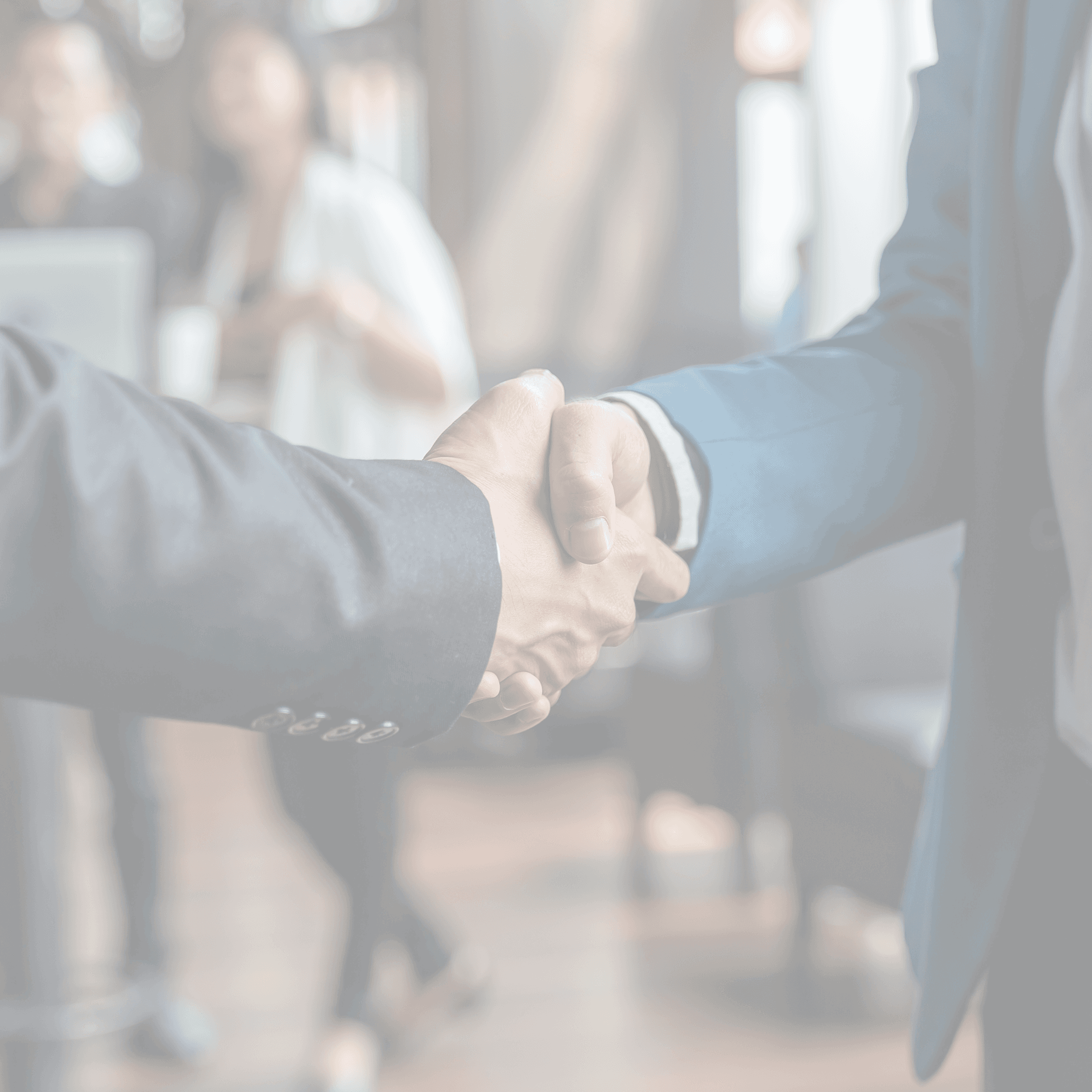 Business partnership handshake representing Valui vendor relationships